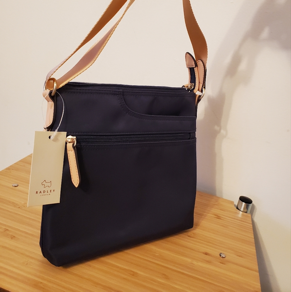 Radley London crossbody. Navy and pale pink. New with tag.